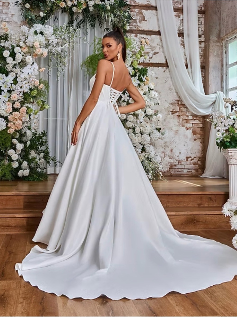 Elegant Ivory Spaghetti-Strap Wedding Dress with Structured Bodice - Picture 3 of 8